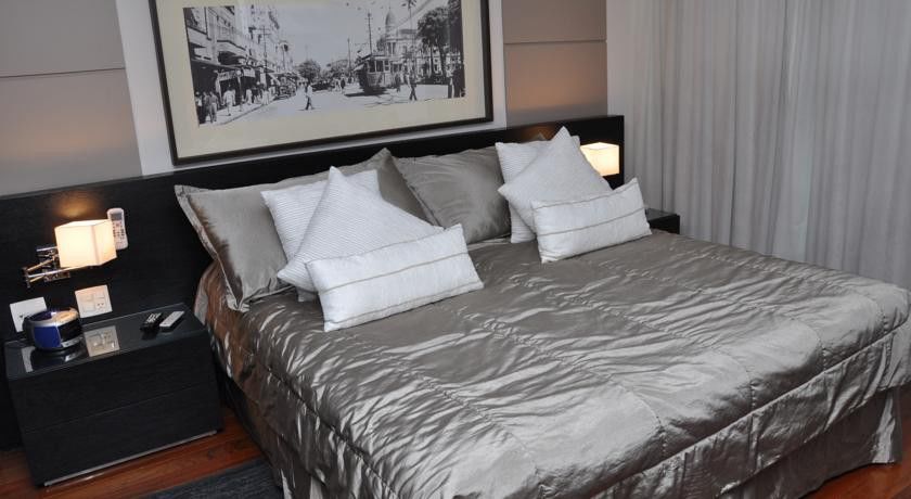 Constantino Hotel e Eventos Juiz de Fora Esterno foto A bed with a duvet